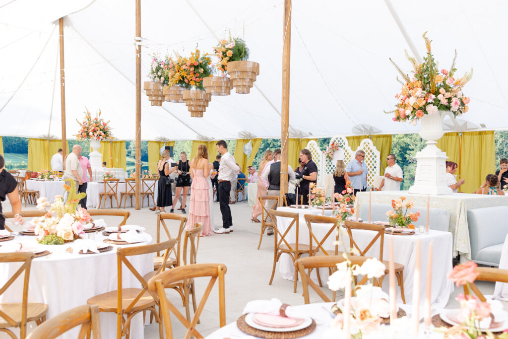 photo of wedding reception under the sail cloth pole tent at Cincinnati, Ohio's outdoor wedding venue: Indie Hollow in Loveland.